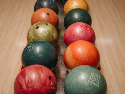 Various fitness equipment neatly arranged on the floor.